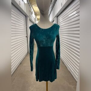 Dark green velvet dance costume or figure skating dress